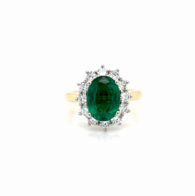 Oval Emerald and Diamond Halo Ring in Yellow Gold & Platinum