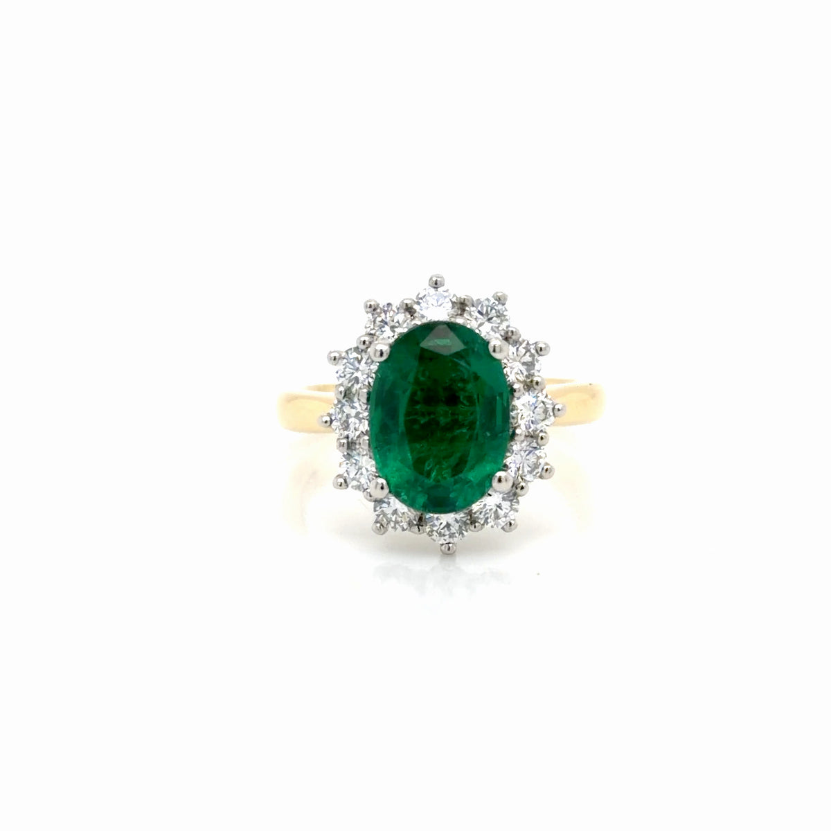 Oval Emerald and Diamond Halo Ring in Yellow Gold & Platinum