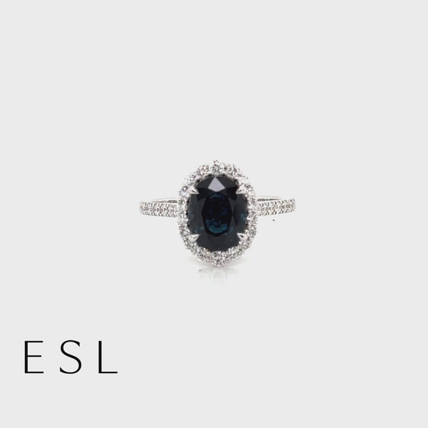 Oval Sapphire Ring With Halo Set In 18ct White Gold